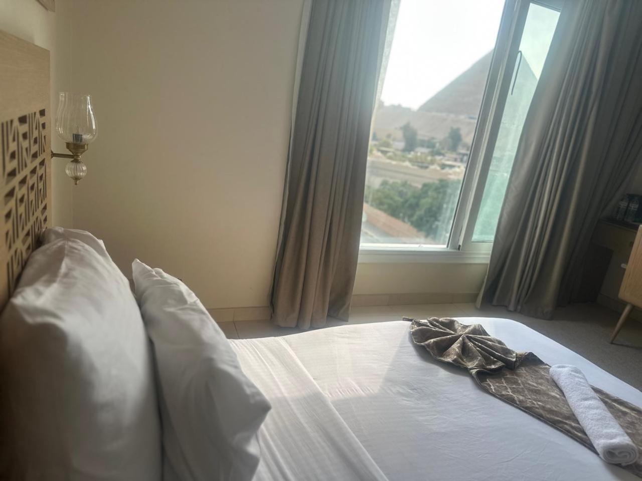 Doudou Pyramids View Hotel Kafret el-Gabal Exterior foto