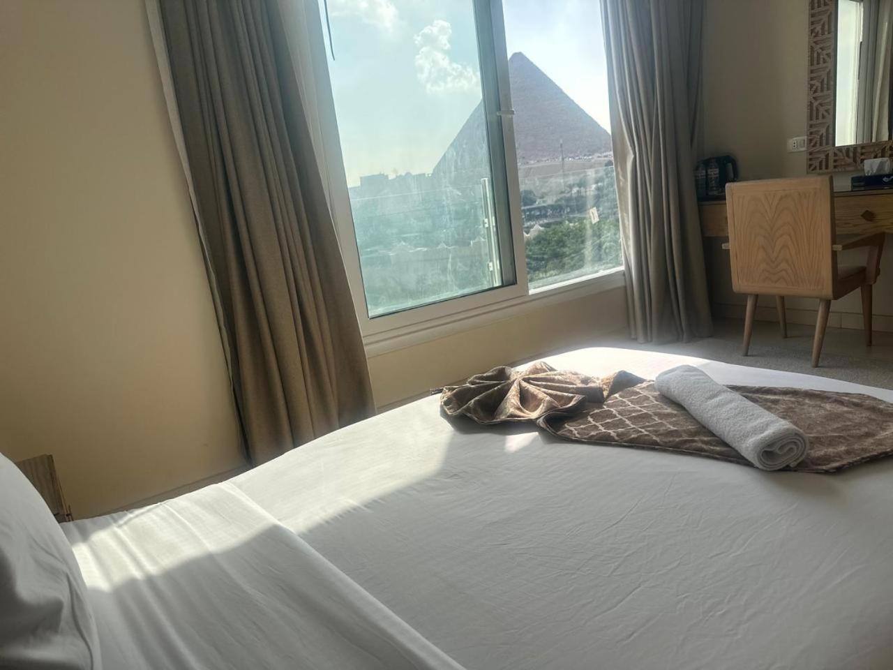 Doudou Pyramids View Hotel Kafret el-Gabal Exterior foto